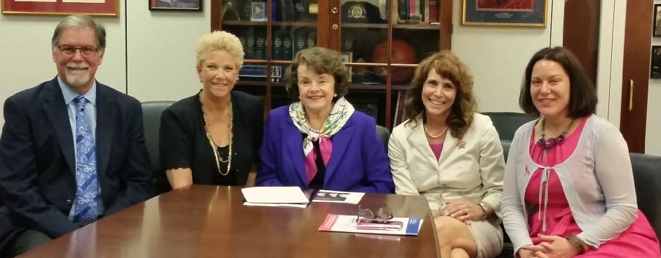 Senator Dianne Feinstein at a conference table with Dr. Cappello, Joan Lunden and fellow advocates