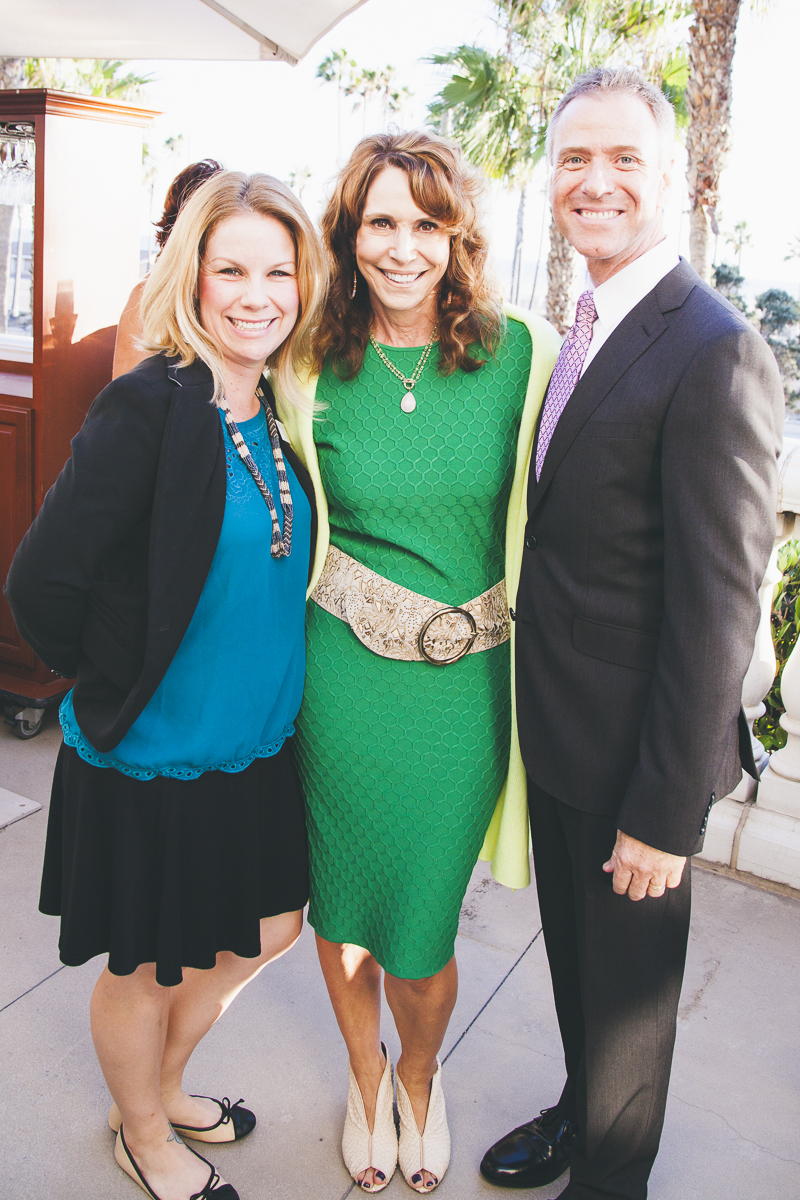 Dr. Cappello with two guests on the seaside terrace at the Beyond the Mammogram reception