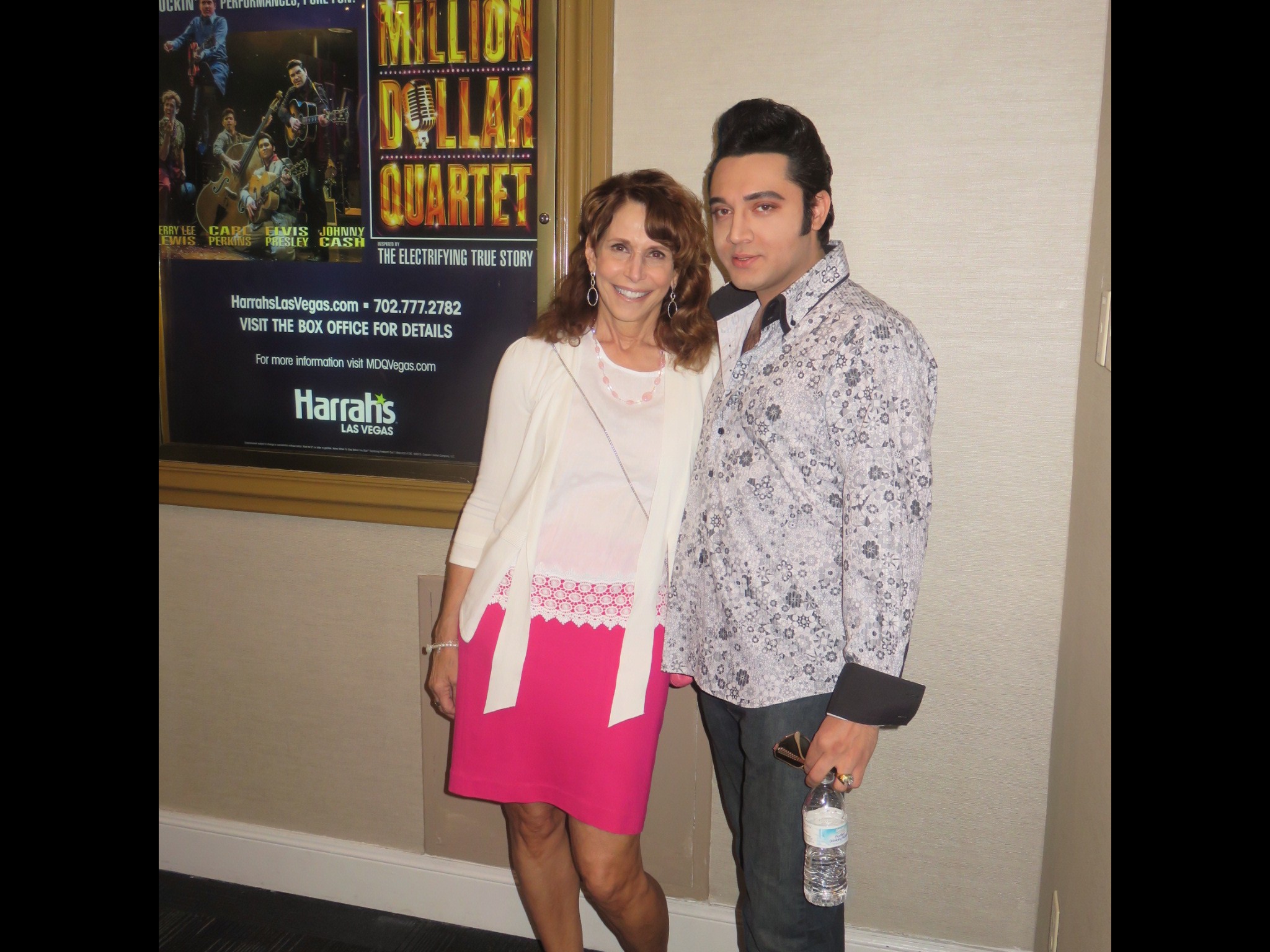 Dr. Cappello and Justin Shandor beside a Million Dollar Quartet poster at Harrah's Las Vegas