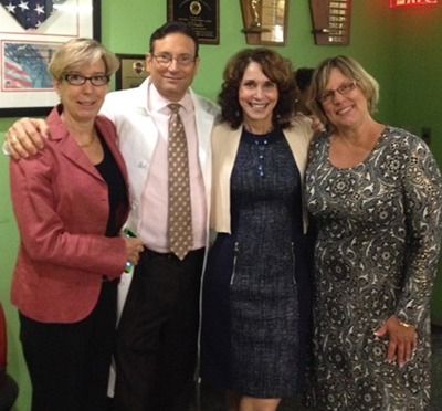 Four guests posing together in the FOX 29 green room