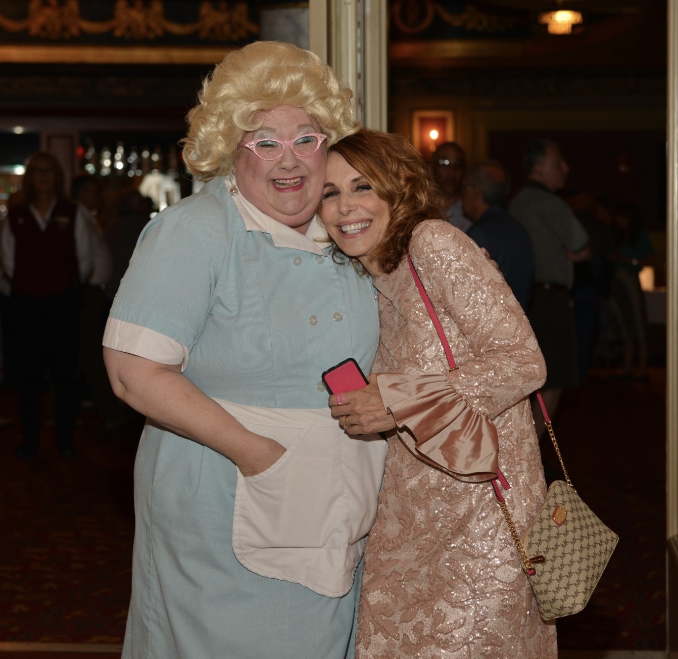 Earlene Babcock, in costume, hugging Dr. Cappello