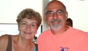 Joanne and a loved one, smiling side by side