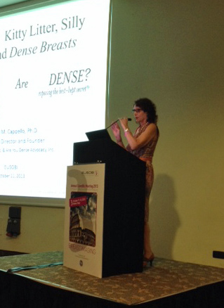 Dr. Cappello lecturing at the EUSOBI podium in Rome in front of her Are You Dense? title slide
