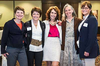 Five symposium speakers, including Dr. Cappello, standing together at the Multnomah Athletic Club