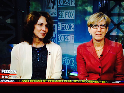 TV screen showing Dr. Cappello and Dr. Conant on the FOX 29 news set