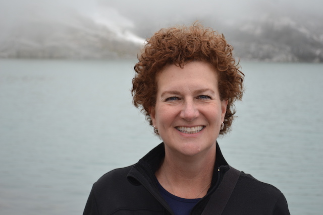 Portrait of Amy by a lake