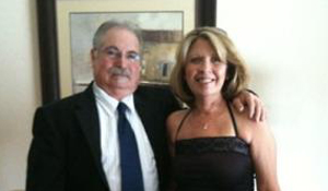 Marci and a loved one dressed up for an evening out