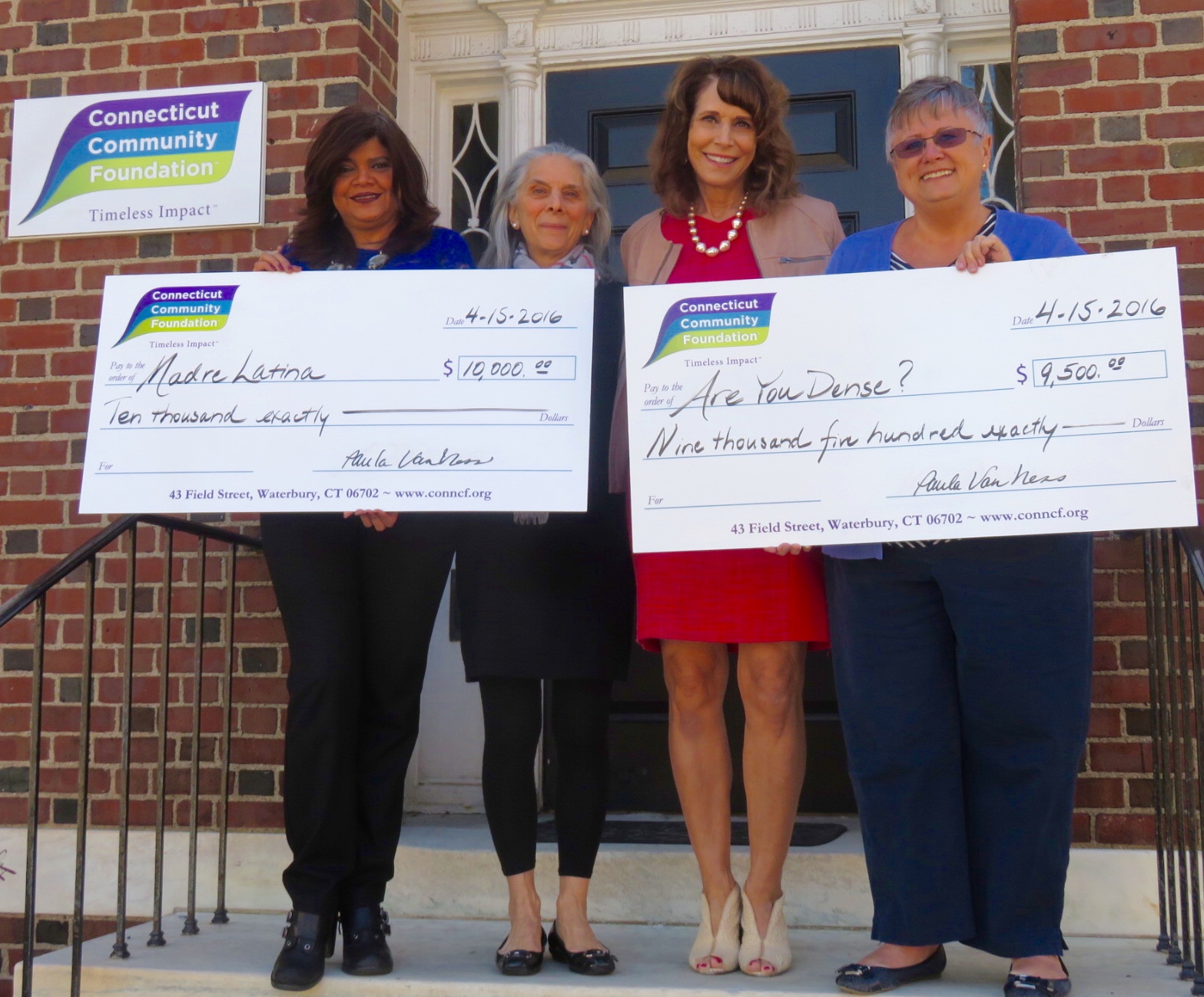 Four women holding Connecticut Community Foundation checks for Madre Latina and Are You Dense?